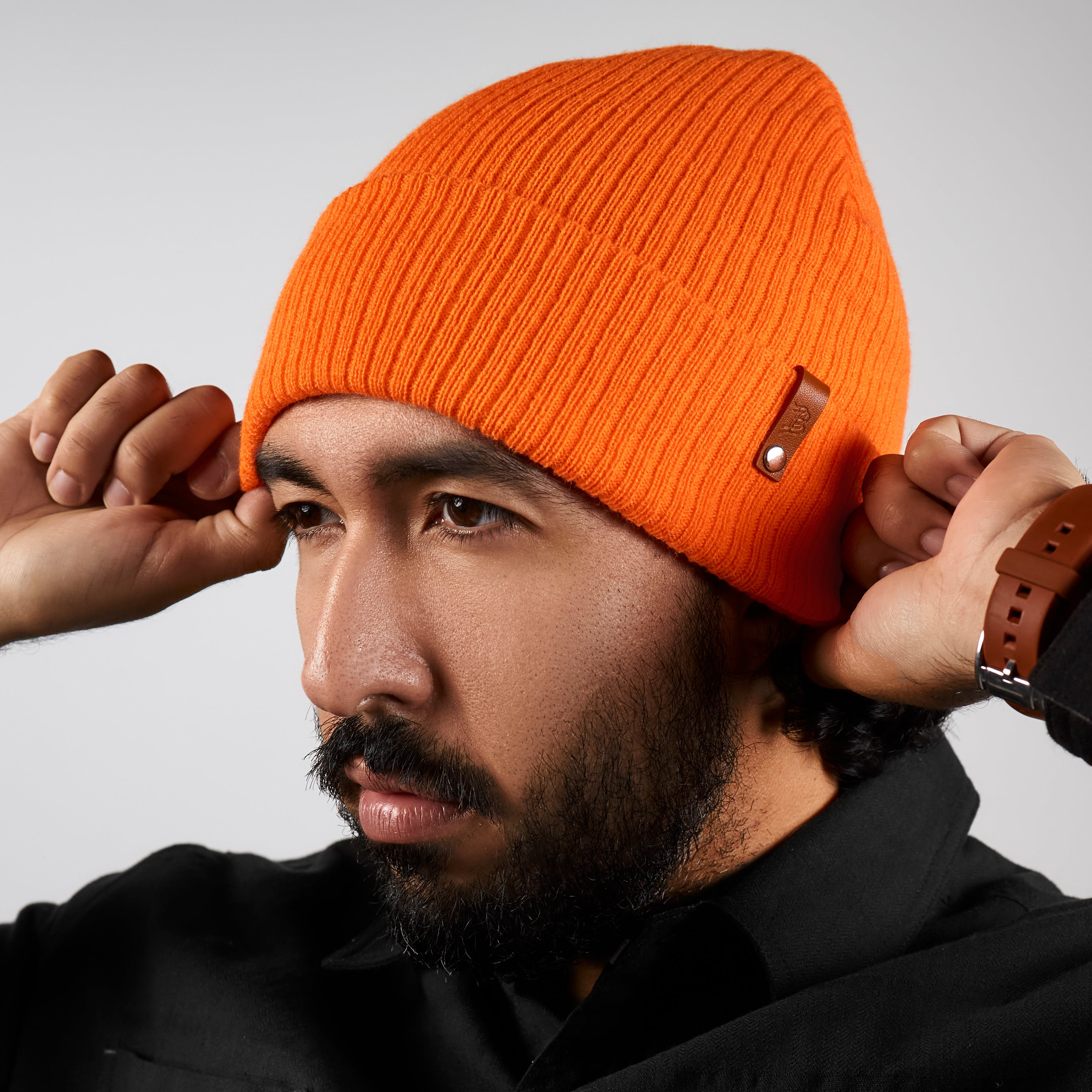 Bare Essential Beanie On Body Blaze Orange